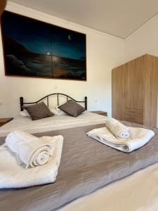 Postel nebo postele na pokoji v ubytování Serenity house