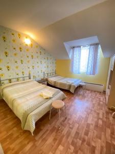 Postel nebo postele na pokoji v ubytování Osobyi Guest house