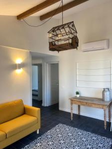 Posezení v ubytování HH Moneglia la Piazzetta L' Attico