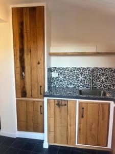 Kuchyň nebo kuchyňský kout v ubytování HH Moneglia la Piazzetta L' Attico