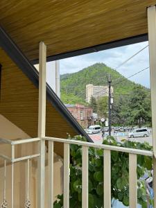 a balcony with a view of a street at Hotel Meidani in Borjomi