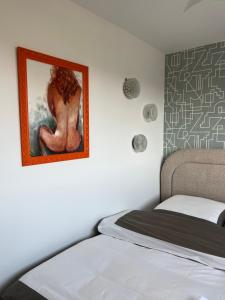 Posteľ alebo postele v izbe v ubytovaní Orange and Towers Apartment