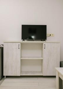 TV o dispositivi per l'intrattenimento presso Lumari Apartment