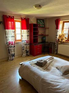 Posteľ alebo postele v izbe v ubytovaní Gîte La maison de Jules