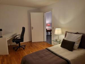 Postel nebo postele na pokoji v ubytování Senseblick zu Bern