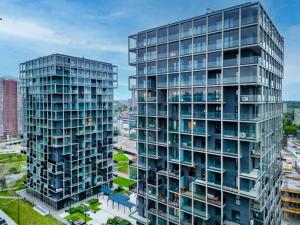 an aerial view of two tall buildings at Katowice Spodek in Katowice