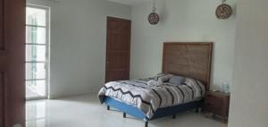 Casa Playa房間的床