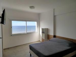 En eller flere senge i et værelse på DAMCHE View