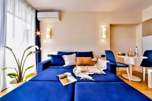 Postel nebo postele na pokoji v ubytování ORBI CITY BLACK SEA VIEW BEACHFRONT KING APARTHOTEL BATUMi