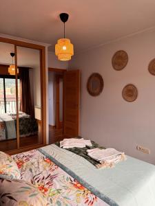 Postel nebo postele na pokoji v ubytování Brisa Atlántica