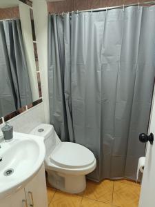 Phòng tắm tại Departamento Punta Arenas a pasos del Mall +4 ảnh