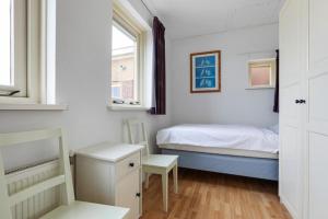 Postel nebo postele na pokoji v ubytování Appartement Zandkorrel