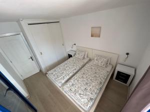 Postel nebo postele na pokoji v ubytování apartmant Adrian Vista Taurito
