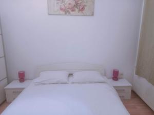Postel nebo postele na pokoji v ubytování Marsala Family B&B