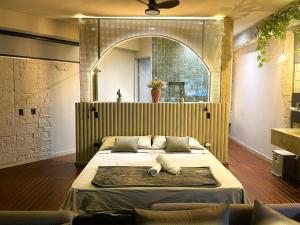 Voodi või voodid majutusasutuse EleMYNT LifeStyle Hotel toas