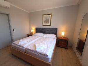 Postel nebo postele na pokoji v ubytování Guesthouse Purbach