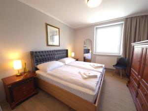 Postel nebo postele na pokoji v ubytování Guesthouse Purbach