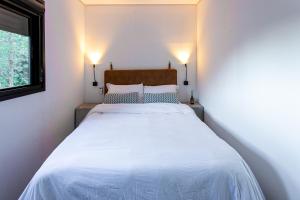 Ένα ή περισσότερα κρεβάτια σε δωμάτιο στο Rancho Conteiner