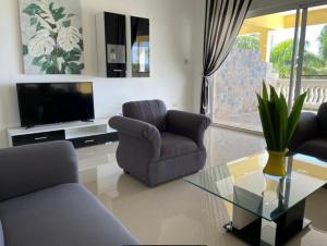 Телевізор і / або розважальний центр в Spring Garden Mobay Resort
