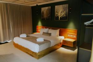 Postel nebo postele na pokoji v ubytování Goland Hotel