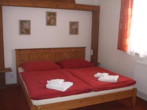 Postel nebo postele na pokoji v ubytování Hotel Selsky Dvur
