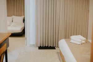 Postel nebo postele na pokoji v ubytování Goland Hotel