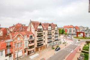 an aerial view of a city with buildings and a street at Hoge 0410 in Koksijde