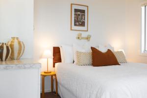 Ένα ή περισσότερα κρεβάτια σε δωμάτιο στο Boorolong 3 - Million dollar views on a budget