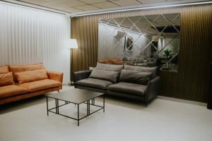 Posezení v ubytování Goland Hotel