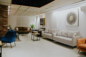 Posezení v ubytování Goland Hotel