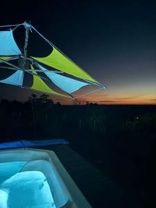 Bazén v ubytování Eco Pousada Por do Sol nebo v jeho okolí