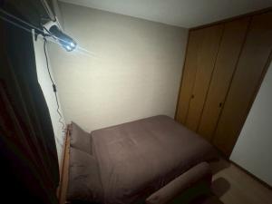 Postel nebo postele na pokoji v ubytování Apartment Hotel Kuki