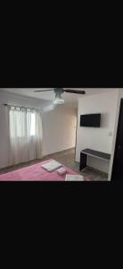 Ένα ή περισσότερα κρεβάτια σε δωμάτιο στο Hotel Sevilla +4 φωτογραφίες