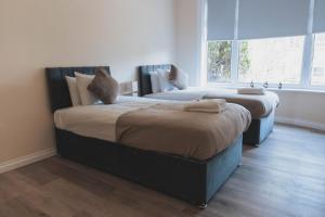 Katil atau katil-katil dalam bilik di Stylish 3BR Home near Hampden No 264 with Free Parking