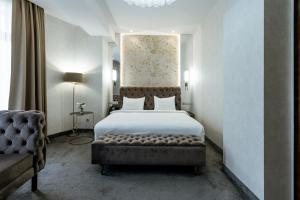 Łóżko lub łóżka w pokoju w obiekcie Highgarden Hotel