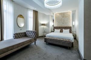 Łóżko lub łóżka w pokoju w obiekcie Highgarden Hotel