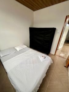 Postel nebo postele na pokoji v ubytování Apartaestudio, fresco y cómodo