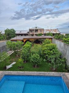 an aerial view of a backyard with a swimming pool at Alyona's house in Vagharshapat