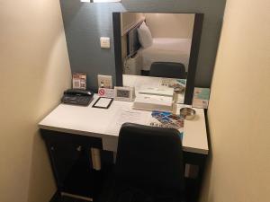 Postel nebo postele na pokoji v ubytování Sanco Inn Nagoya Fushimi