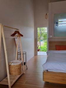 Postel nebo postele na pokoji v ubytování Tran Phu Riverside House