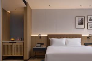 Letto o letti in una camera di Four Points by Sheraton Kunming Dongfeng Square