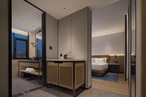 Letto o letti in una camera di Four Points by Sheraton Kunming Dongfeng Square