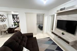 Televisyen dan/atau pusat hiburan di Edifício com Ótima localização e Conforto
