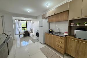 Dapur atau dapur kecil di Edifício com Ótima localização e Conforto