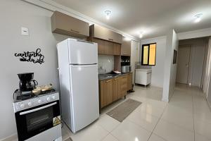 Dapur atau dapur kecil di Edifício com Ótima localização e Conforto