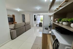 Dapur atau dapur kecil di Edifício com Ótima localização e Conforto