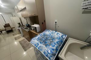 Dapur atau dapur kecil di Edifício com Ótima localização e Conforto
