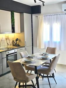 Kuchyň nebo kuchyňský kout v ubytování V&L Apartman