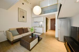 Kuchyň nebo kuchyňský kout v ubytování Dabaizhijia Executive Apartment Bantian Huawei Branch