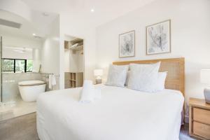 Voodi või voodid majutusasutuse Mirra Chana Beachfront Apartments Mooloolaba toas
